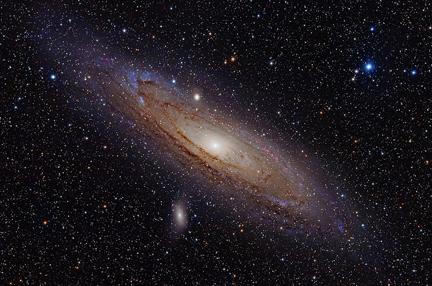 The andromeda galaxy,a spiral galaxy with 2 notable dwarf companions.